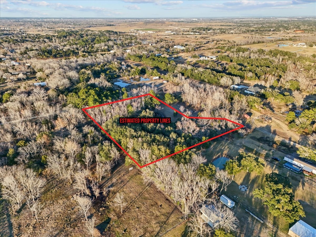 0 Blessing Way Santa Fe, TX 77510 - Photo 3 of 12 an aerial view of residential houses with outdoor space and trees