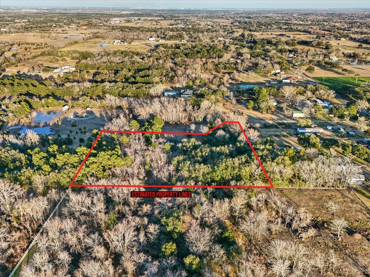 0 Blessing Way Santa Fe, TX 77510 - Photo 4 of 12 an aerial view of residential houses with outdoor space and trees