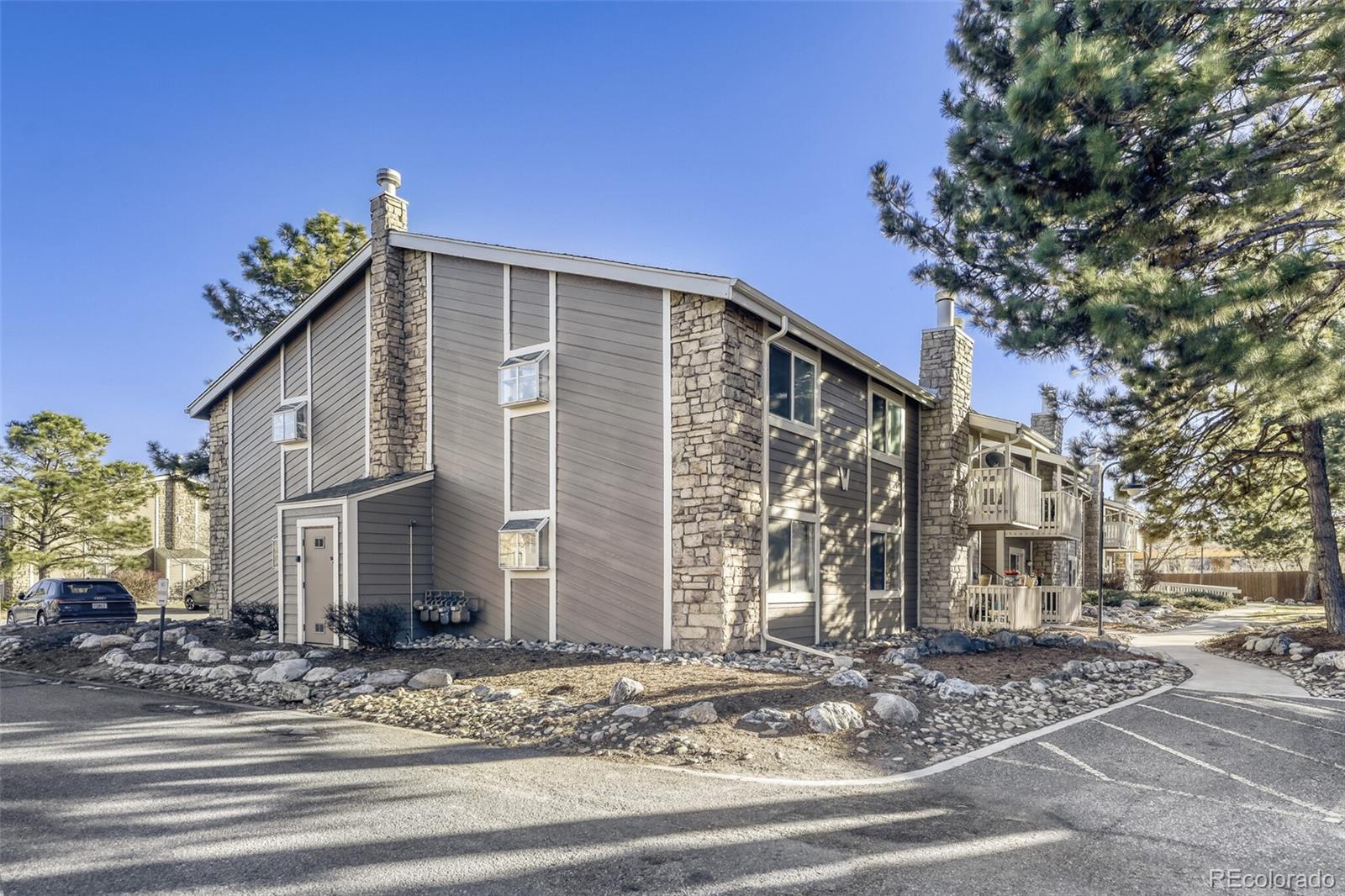 4400 South Quebec Street, Unit 106W Denver, CO 80237 - Photo 2 of 17 a front view of a house