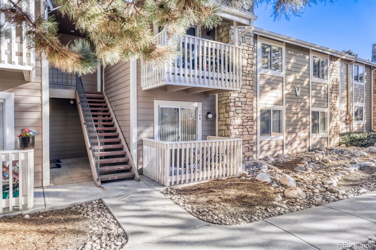 4400 South Quebec Street, Unit 106W Denver, CO 80237 - Photo 5 of 17 a view of a house with a deck