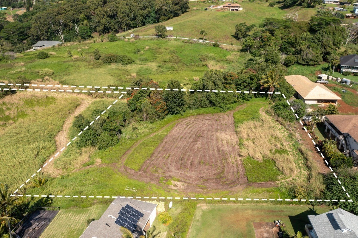 4758 Lae Road, Unit C Kalaheo, HI 96741 - Photo 2 of 8 a view of a lake with a yard