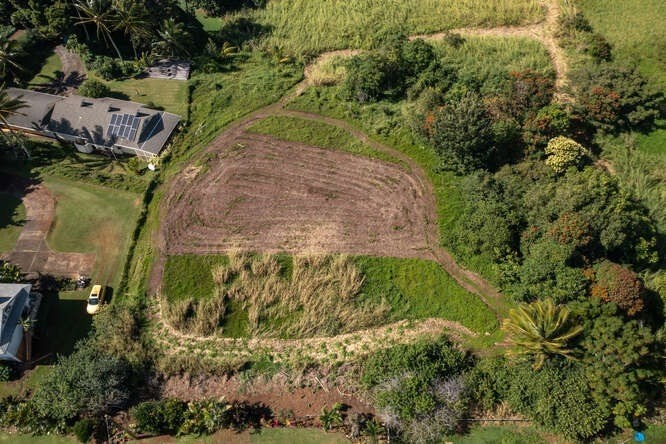 4758 Lae Road, Unit C Kalaheo, HI 96741 - Photo 5 of 8 an aerial view of a residential houses with yard