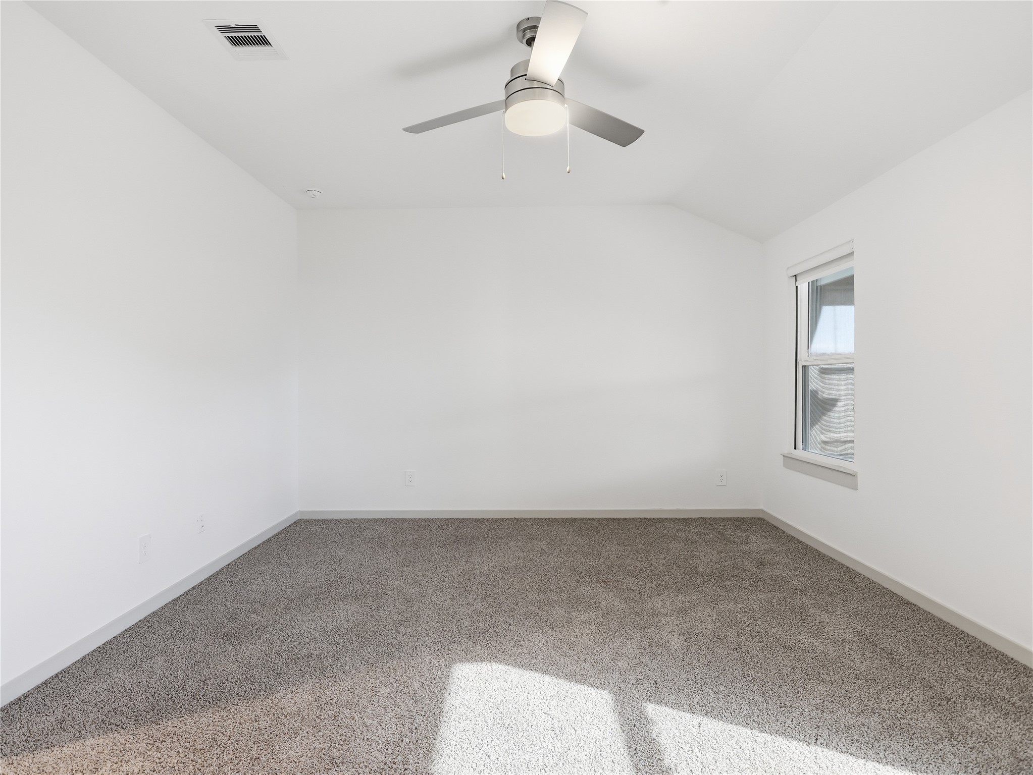 29903 Violet Sky Way Katy, TX 77494 - Photo 15 of 38 an empty room with a empty space and windows