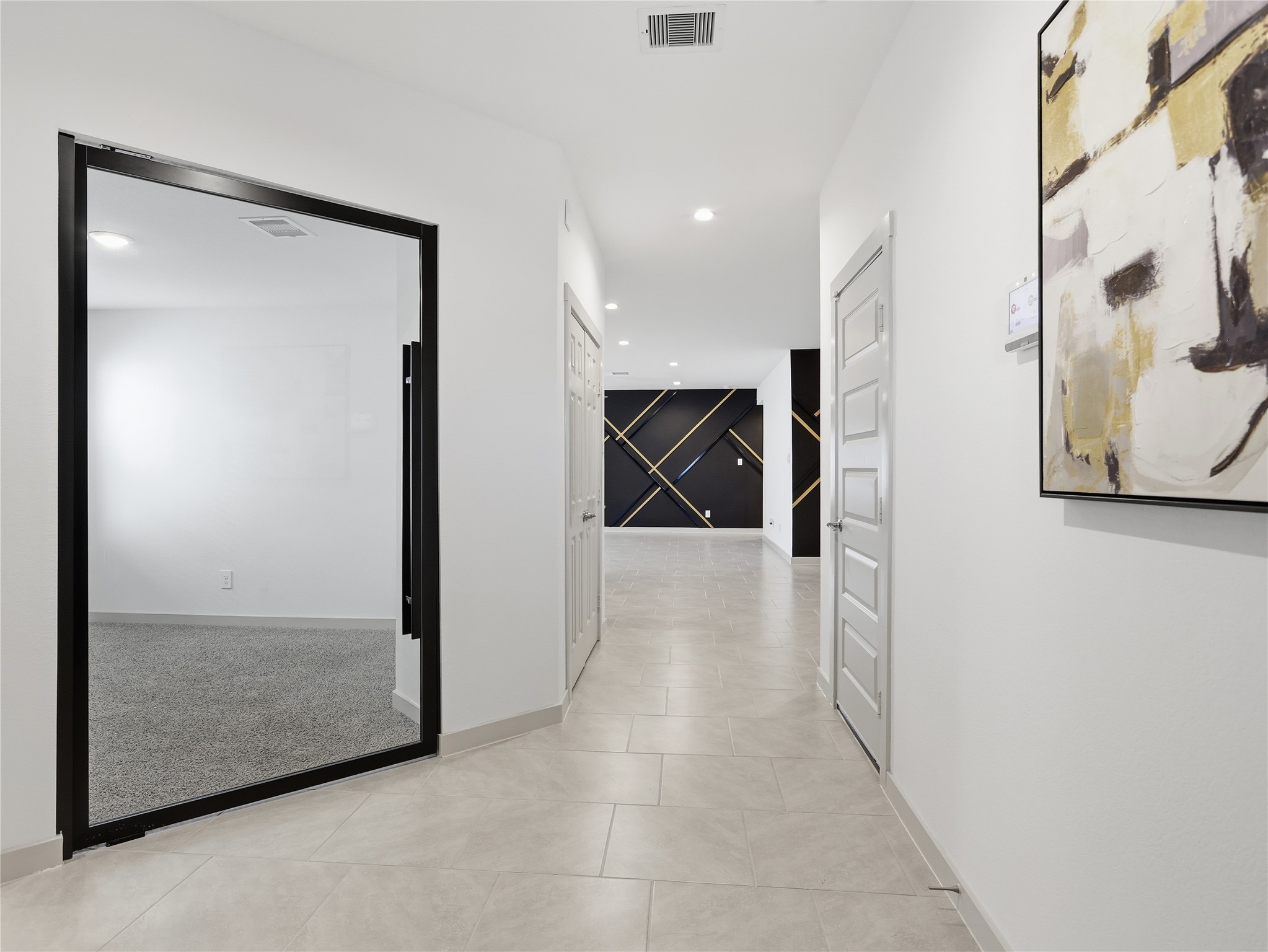29903 Violet Sky Way Katy, TX 77494 - Photo 6 of 38 a view of a hallway with wooden floor