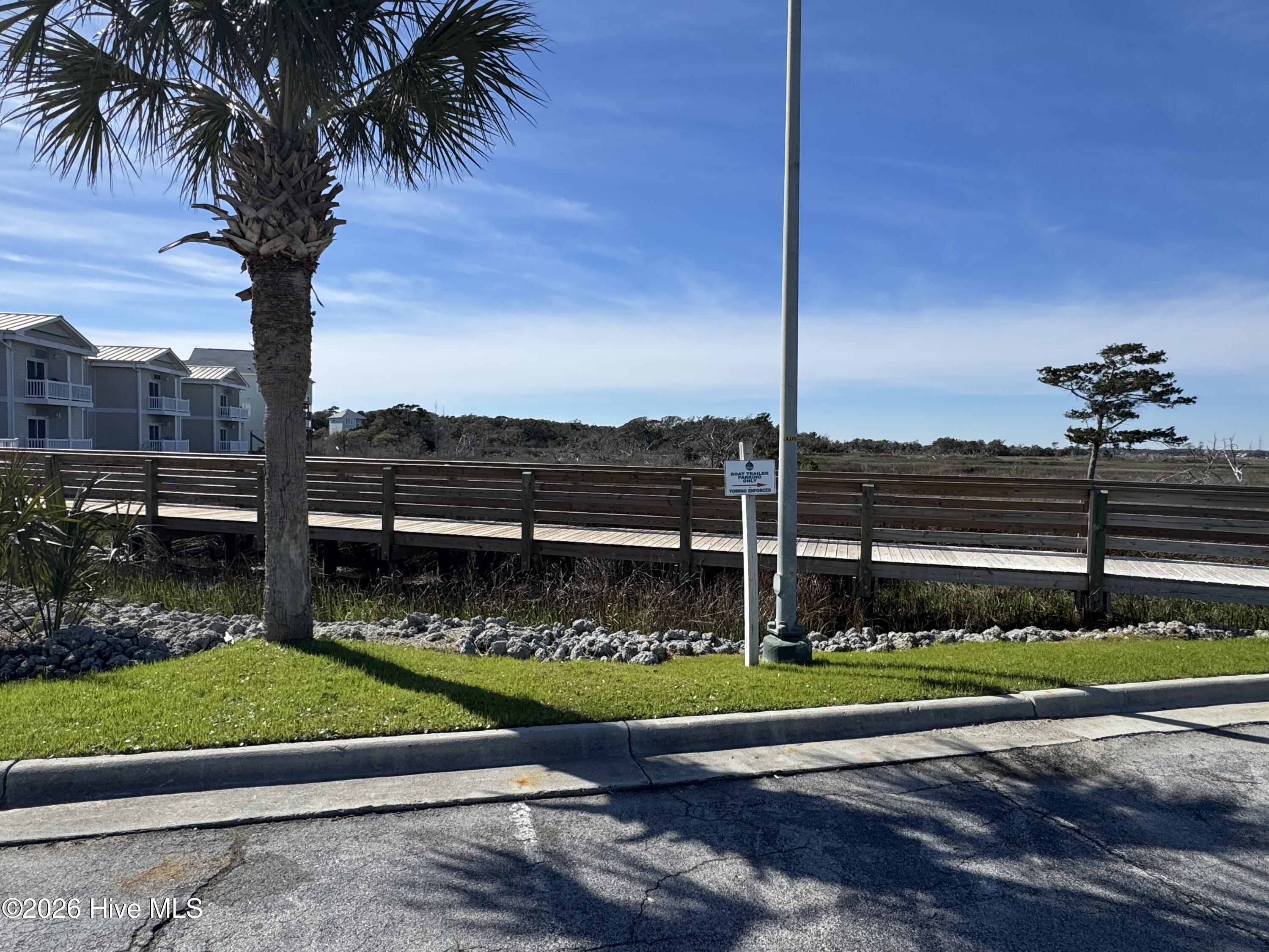 602 West Fort Macon Road, Unit 242 Atlantic Beach, NC 28512 - Photo 29 of 40 Walk way