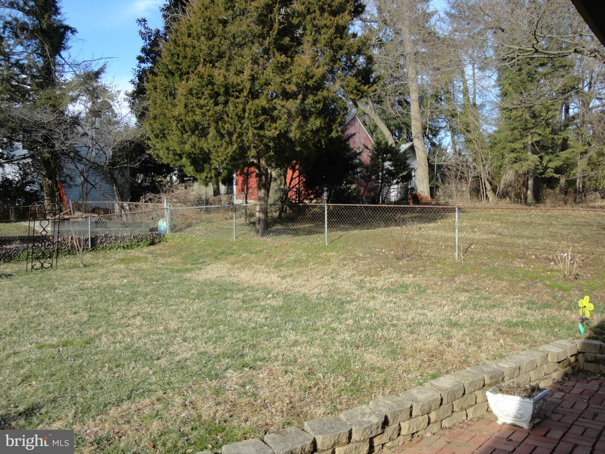 1919 Grace Church Road Silver Spring, MD 20910 - Photo 22 of 23 a view of a park with large trees