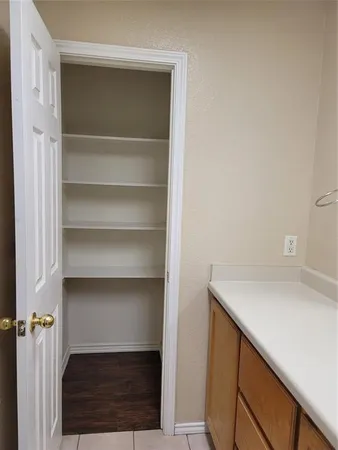 a view of small space with racks on the wall