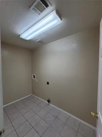 a bathroom with a sink a toilet and a large mirror