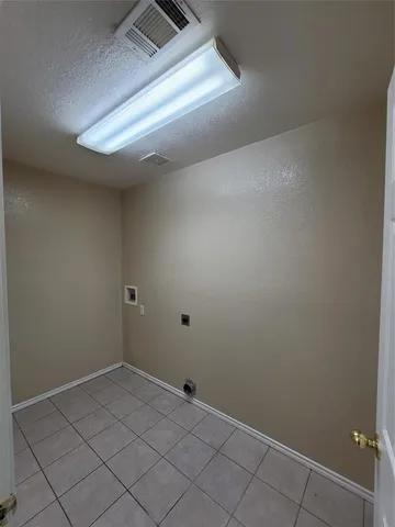a bathroom with a sink a toilet and a large mirror