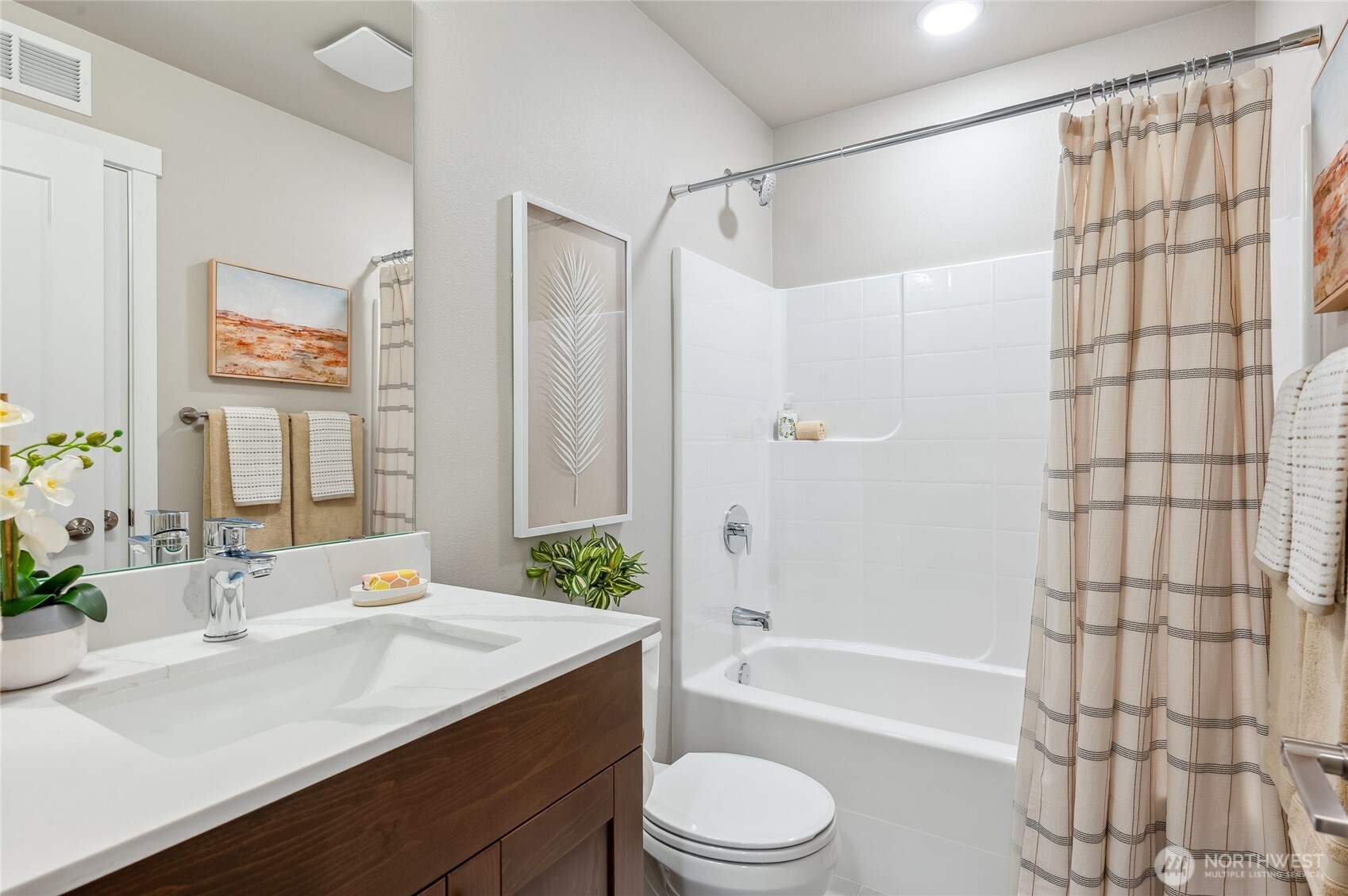1322 194th Street Southeast, Unit D4 Bothell, WA 98012 - Photo 18 of 18 a bathroom with a sink a toilet a bathtub and shower