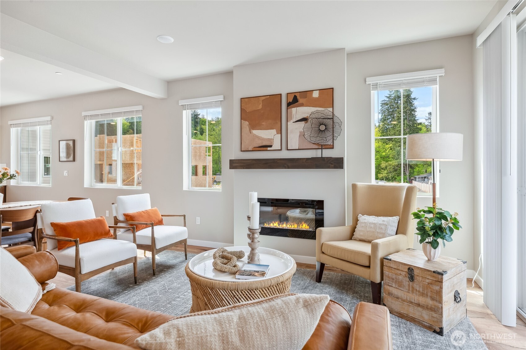 1322 194th Street Southeast, Unit D4 Bothell, WA 98012 - Photo 3 of 18 a living room with furniture fireplace and a large window