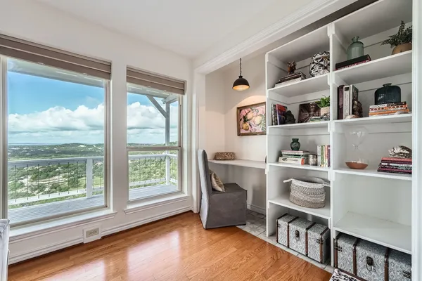 a workspace with furniture and window