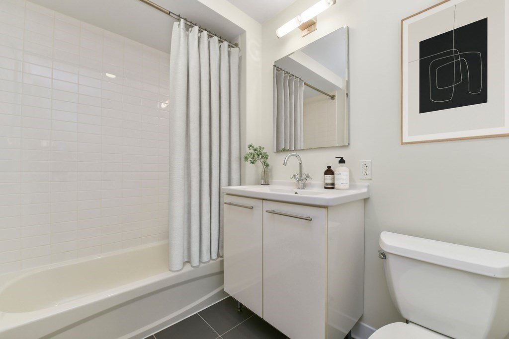 2 Earhart Street, Unit 324 Cambridge, MA 02141 - Photo 14 of 42 a bathroom with a sink toilet and shower