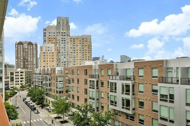 a view of a city with tall buildings