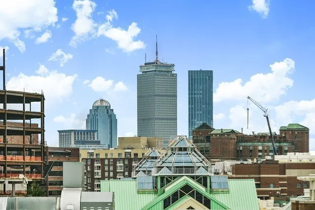 a large building with a yard in front of it