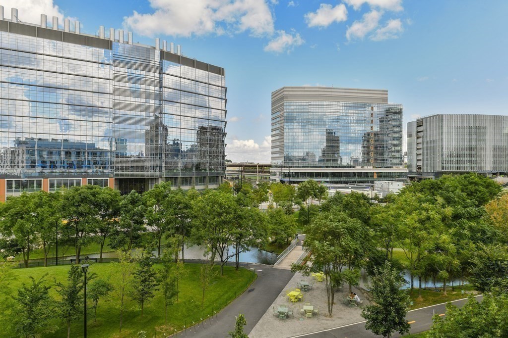 2 Earhart Street, Unit 324 Cambridge, MA 02141 - Photo 23 of 42 a large building with a yard in front of it