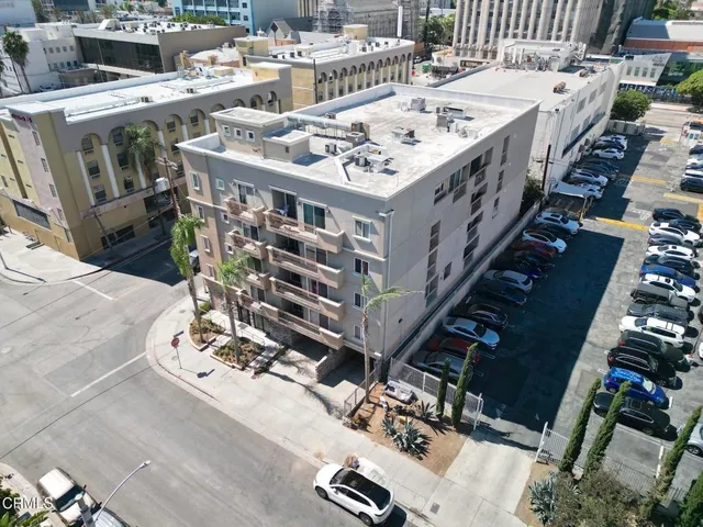 a front view of a building with street view