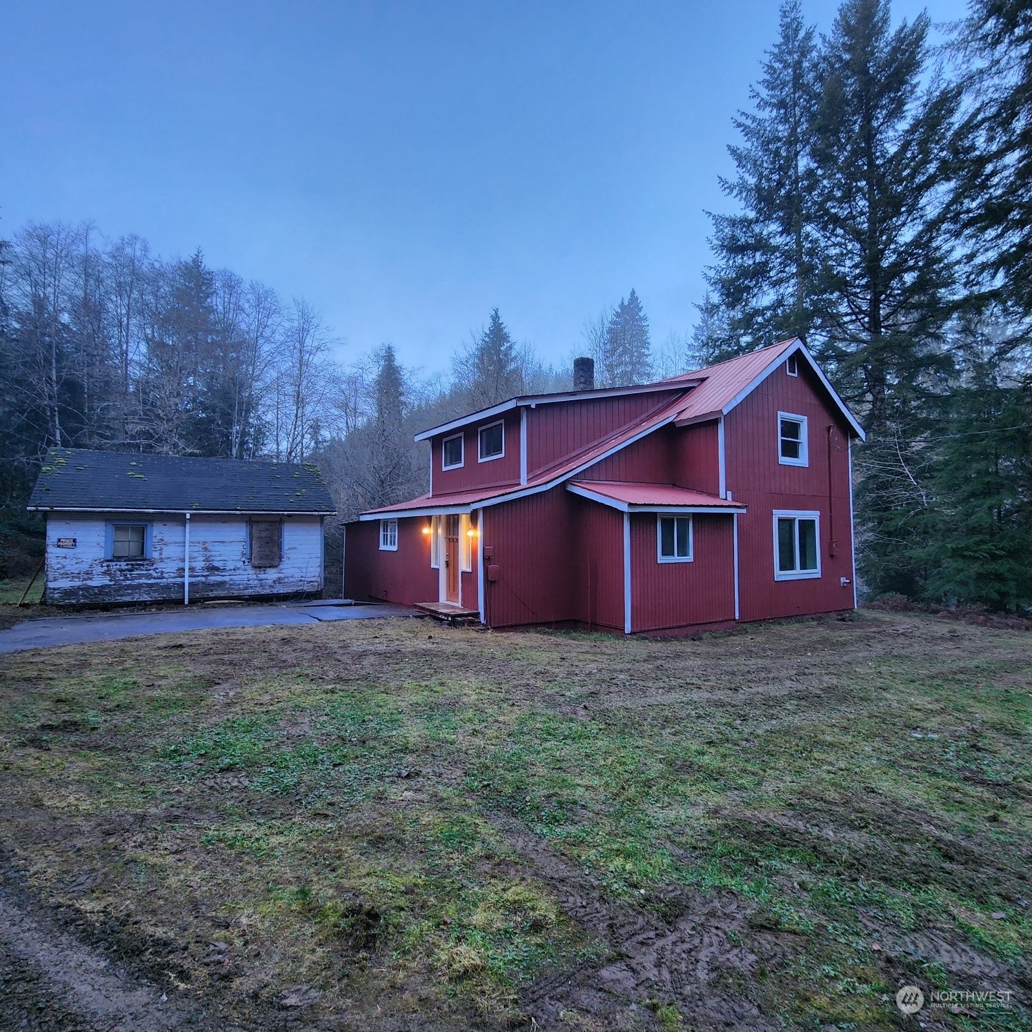 62 Kin Road Naselle, WA 98638 - Photo 1 of 20 a view of a house with a yard and large tree