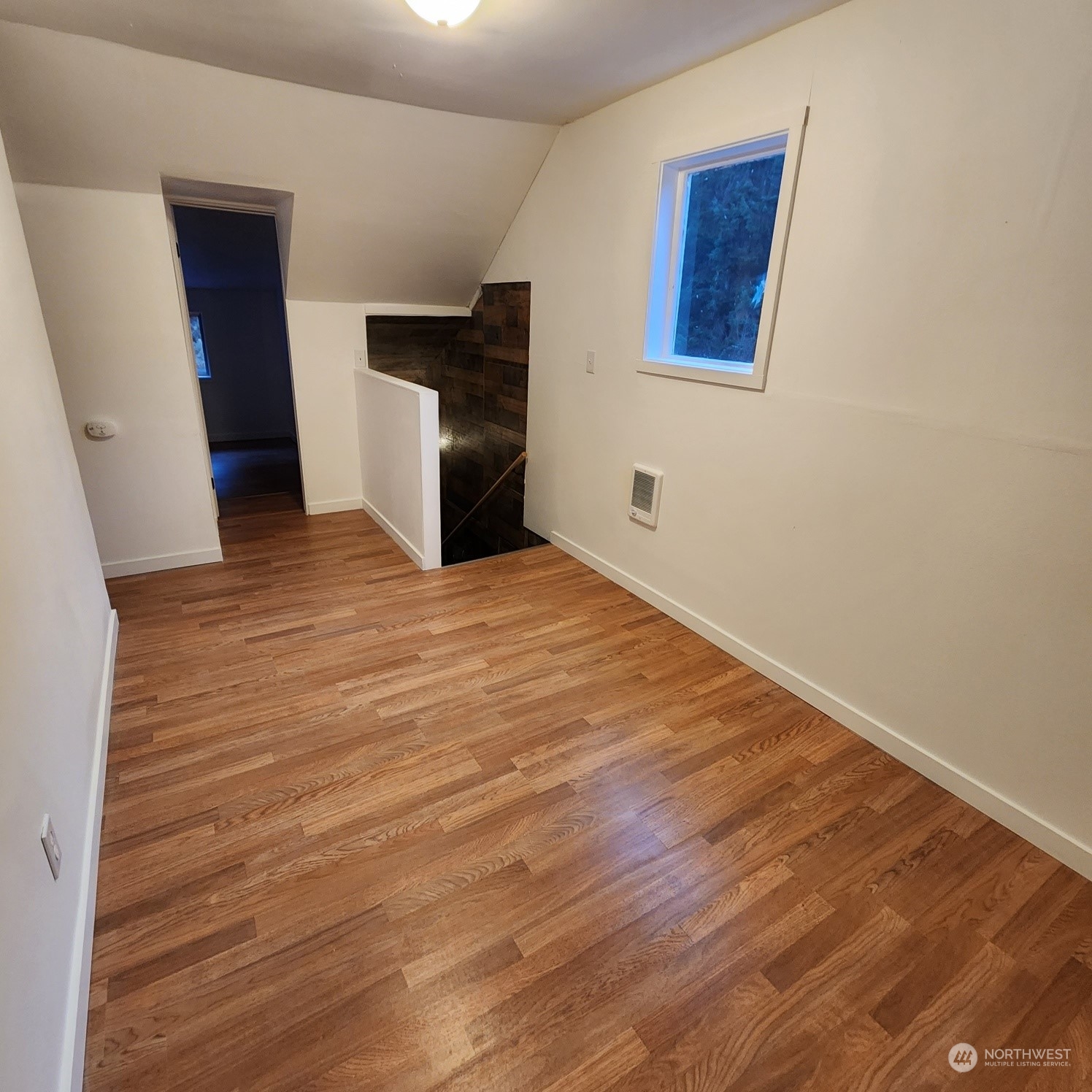 62 Kin Road Naselle, WA 98638 - Photo 12 of 20 a view of an empty room with a window