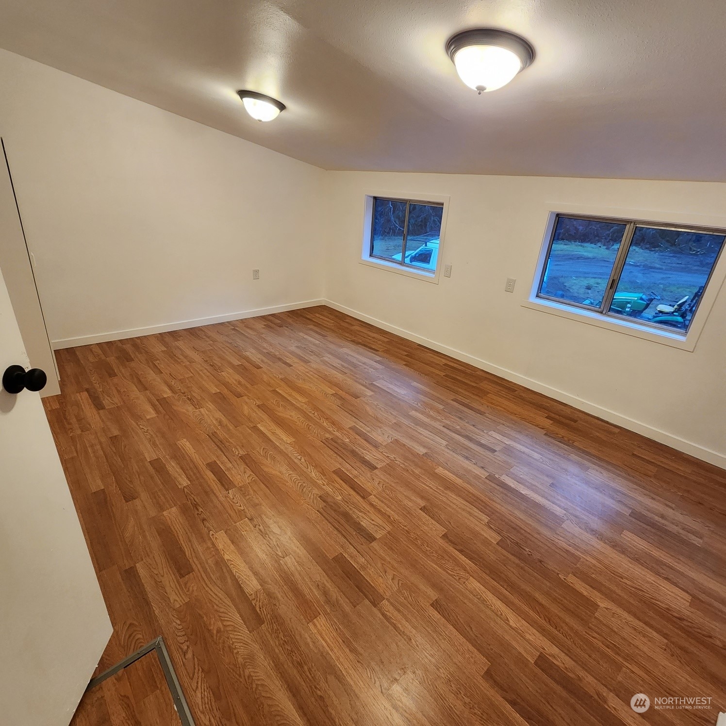 62 Kin Road Naselle, WA 98638 - Photo 13 of 20 an empty room with wooden floor