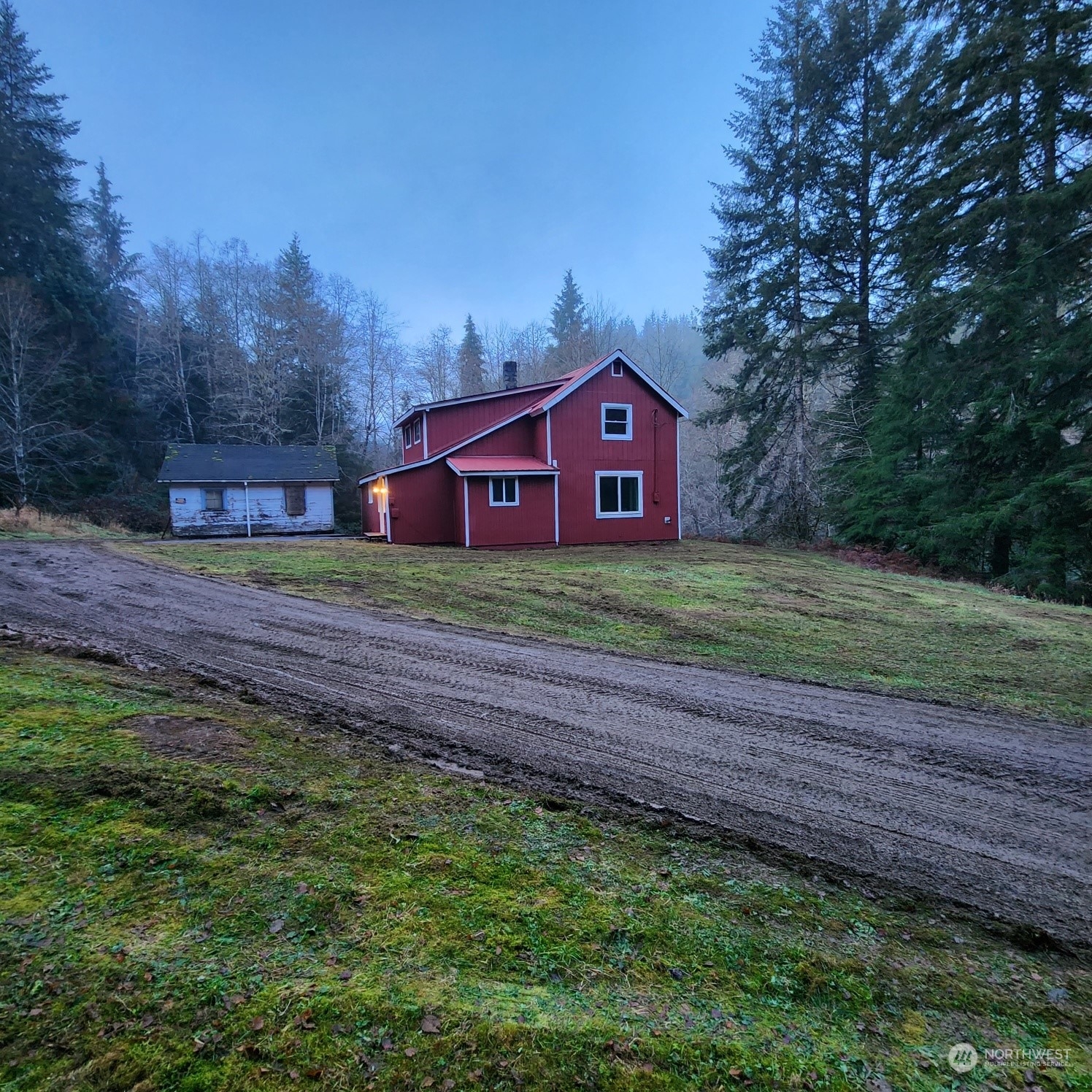 62 Kin Road Naselle, WA 98638 - Photo 19 of 20 a big yard with large trees and a wooden fence