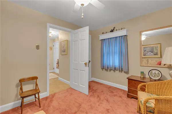 a view of a livingroom with furniture and furniture