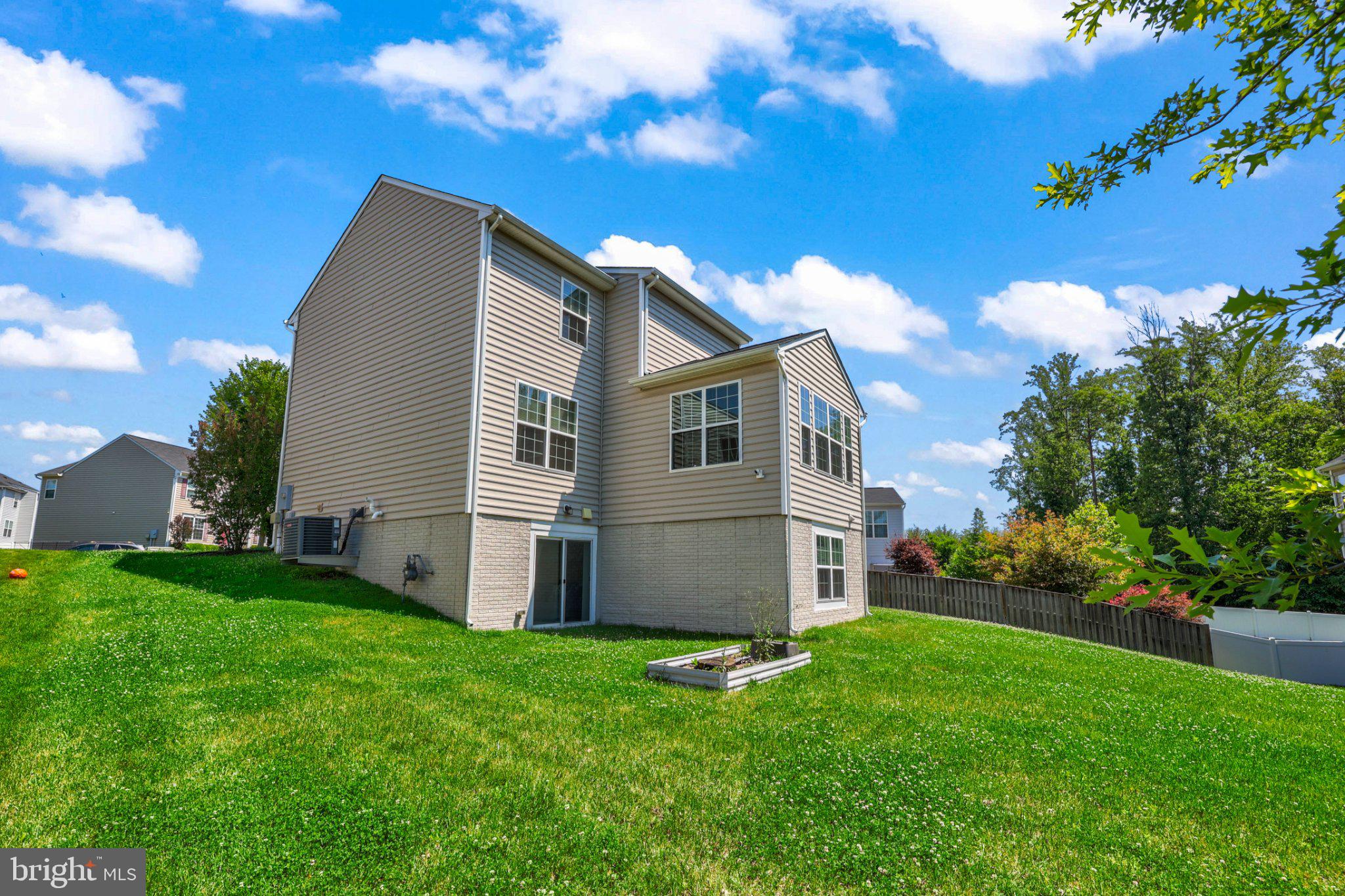 16183 Raptor Crest Lane Woodbridge, VA 22193 - Photo 35 of 51 Charming home with lush green yard.