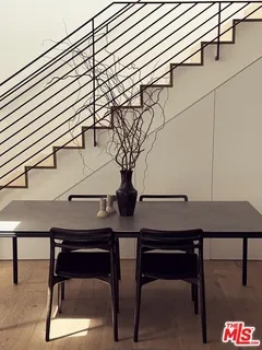 a view of a workspace with furniture