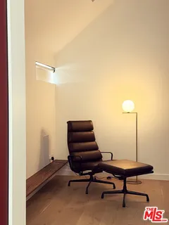 a view of a workspace with furniture