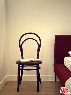 a room with furniture and a mirror
