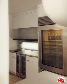 a kitchen with a stove and a microwave