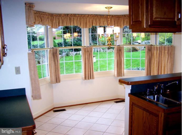 2373 Bear Den Road Frederick, MD 21701 - Photo 20 of 26 a kitchen with a window a sink and a stove