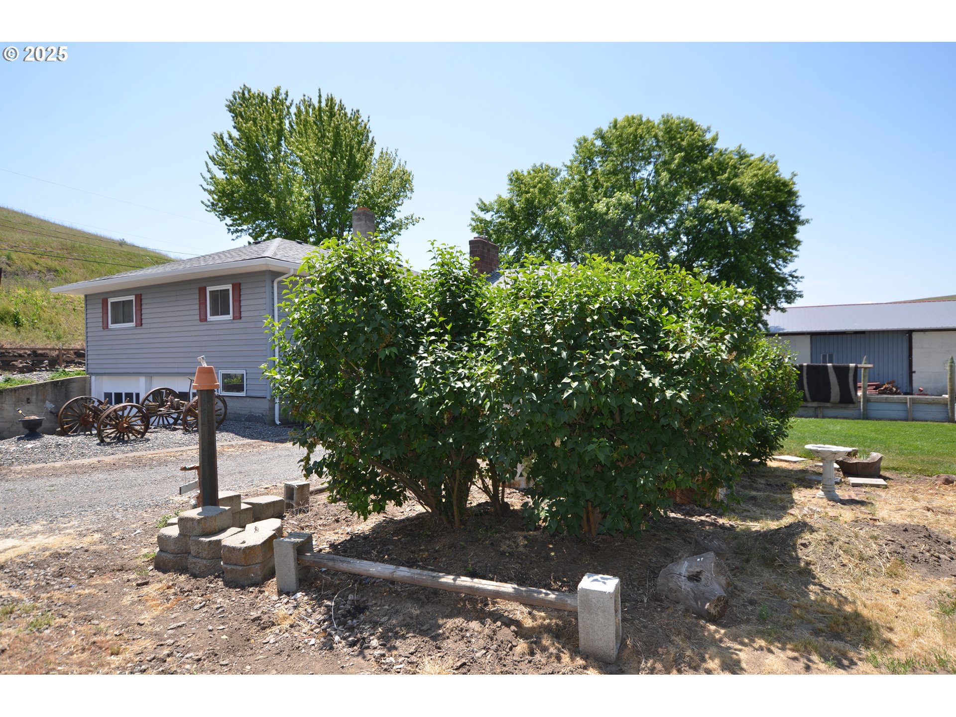 46083 Adams Road Pendleton, OR 97801 - Photo 11 of 47 a view of a house with a yard