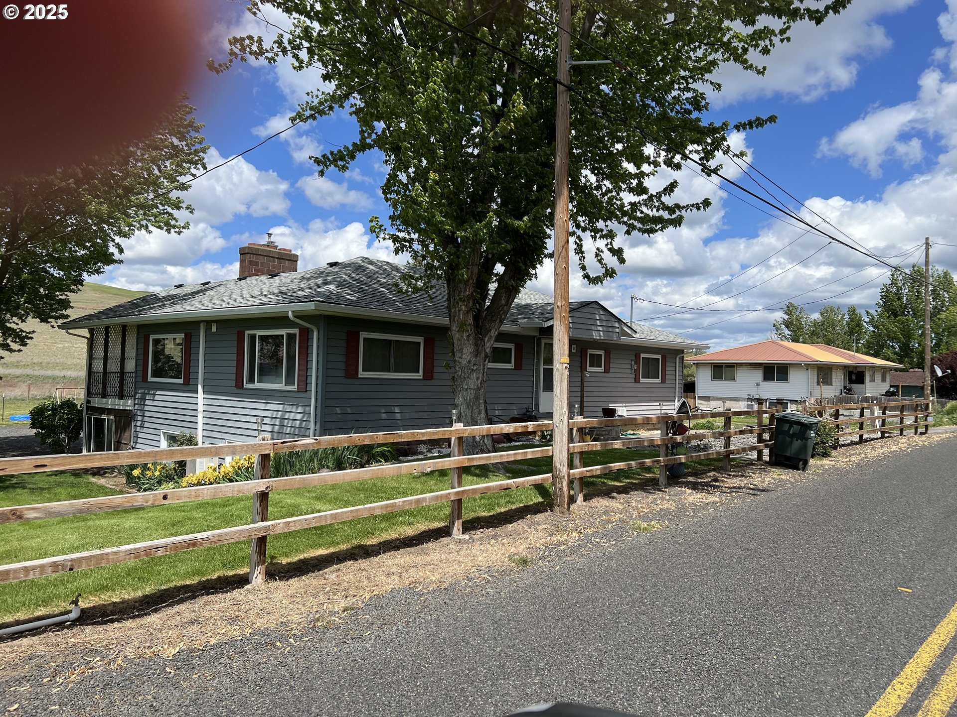 46083 Adams Road Pendleton, OR 97801 - Photo 2 of 47 a front view of a house with a yard