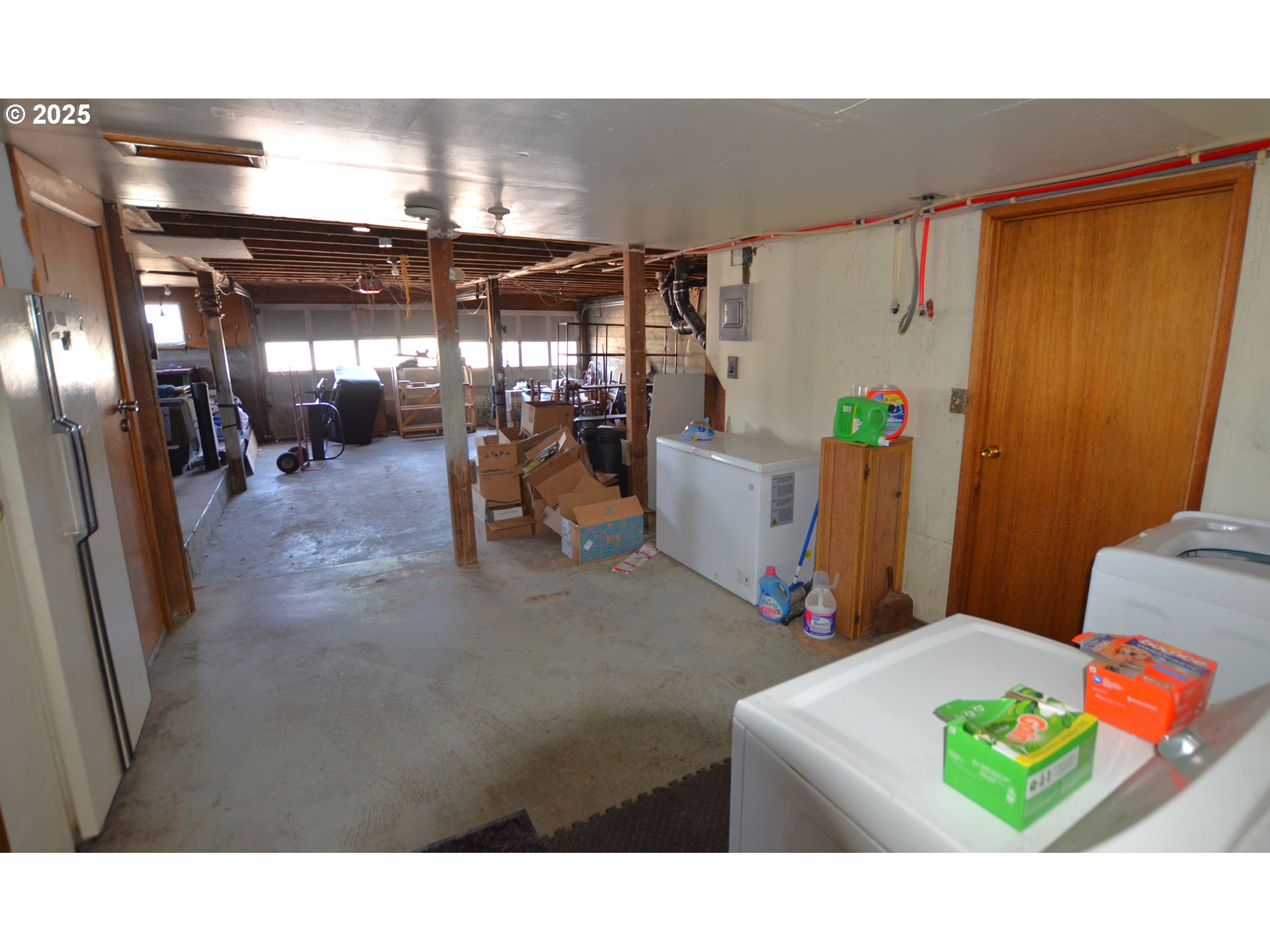 46083 Adams Road Pendleton, OR 97801 - Photo 22 of 47 a living room with furniture and chandelier