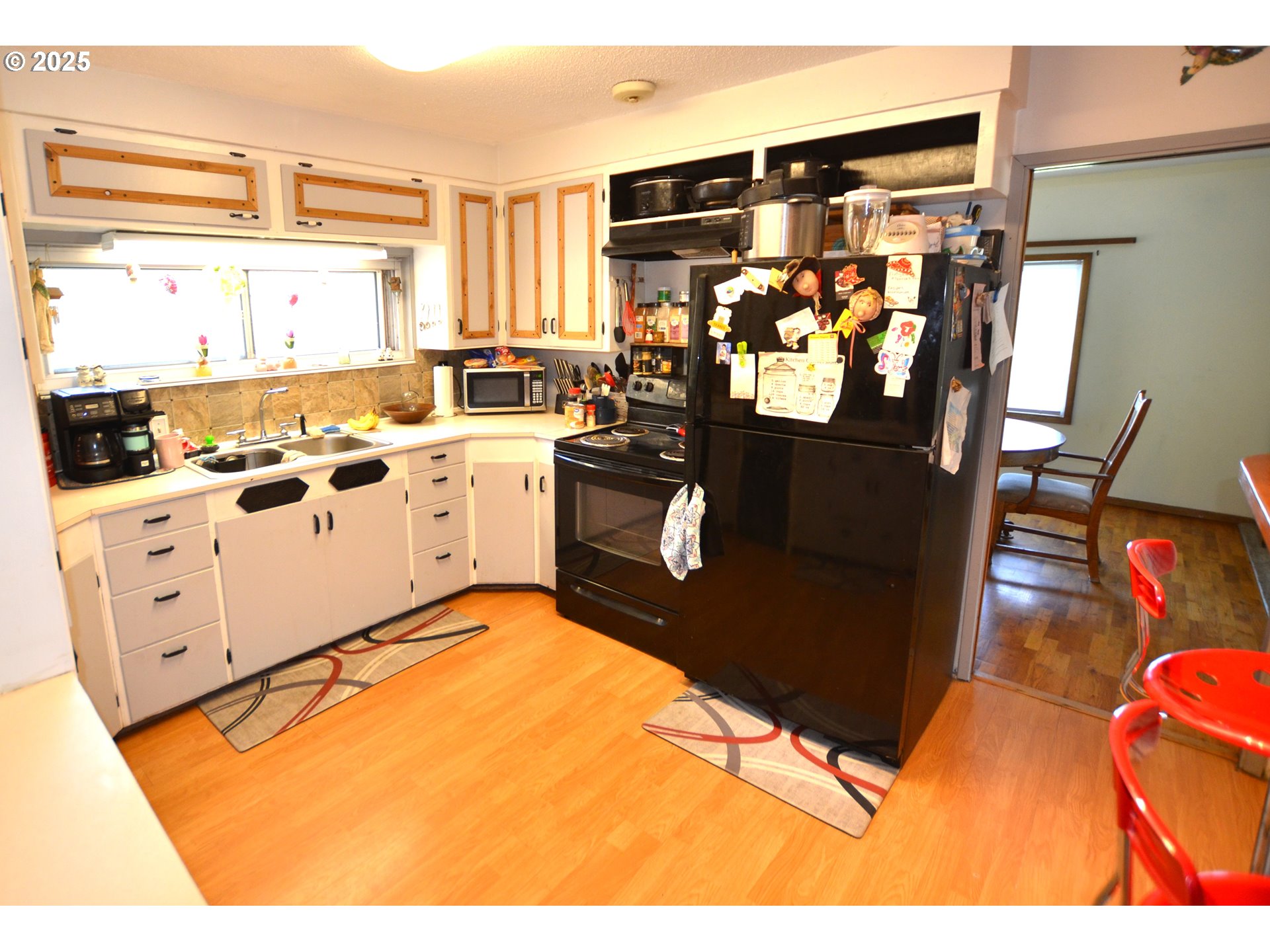 46083 Adams Road Pendleton, OR 97801 - Photo 33 of 47 a kitchen with stainless steel appliances granite countertop a stove a sink and a refrigerator