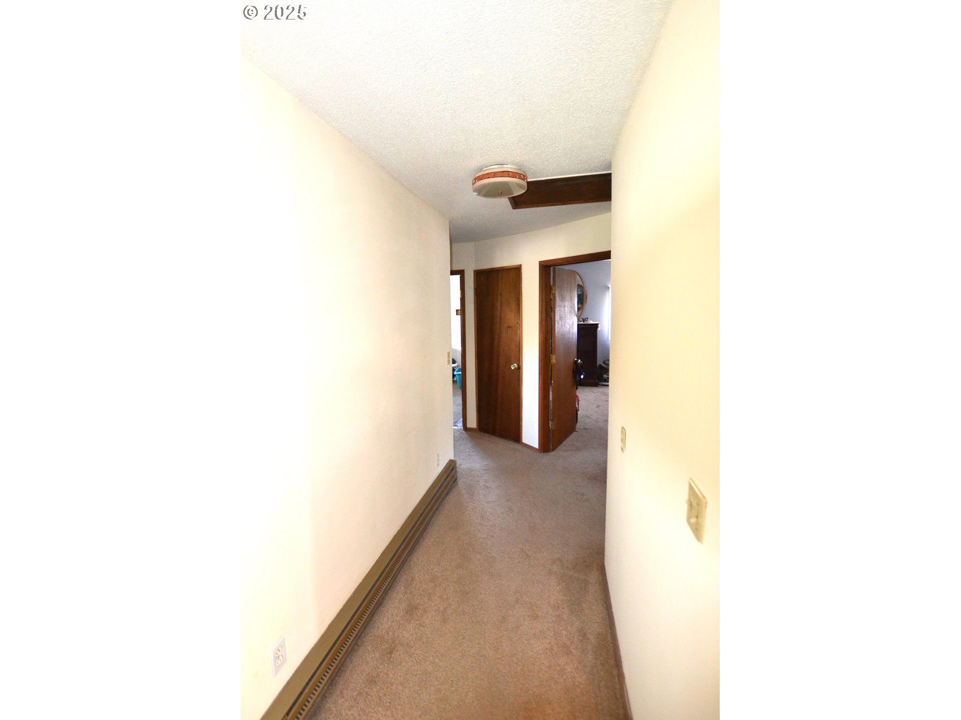 46083 Adams Road Pendleton, OR 97801 - Photo 37 of 47 a view of a hallway with some walls
