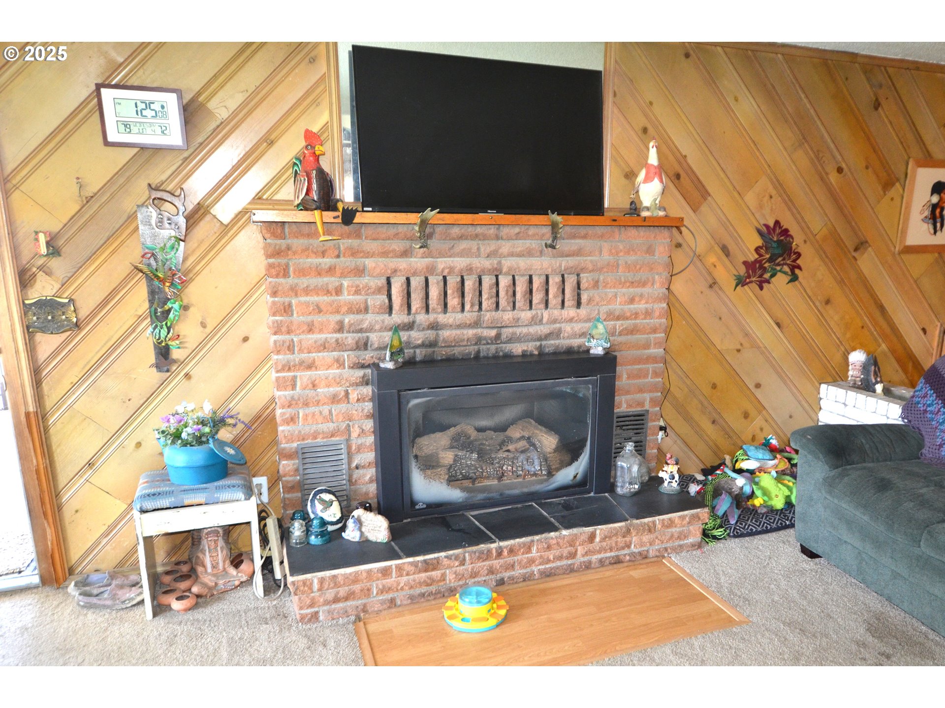 46083 Adams Road Pendleton, OR 97801 - Photo 44 of 47 a view of a fireplace with furniture and a fireplace