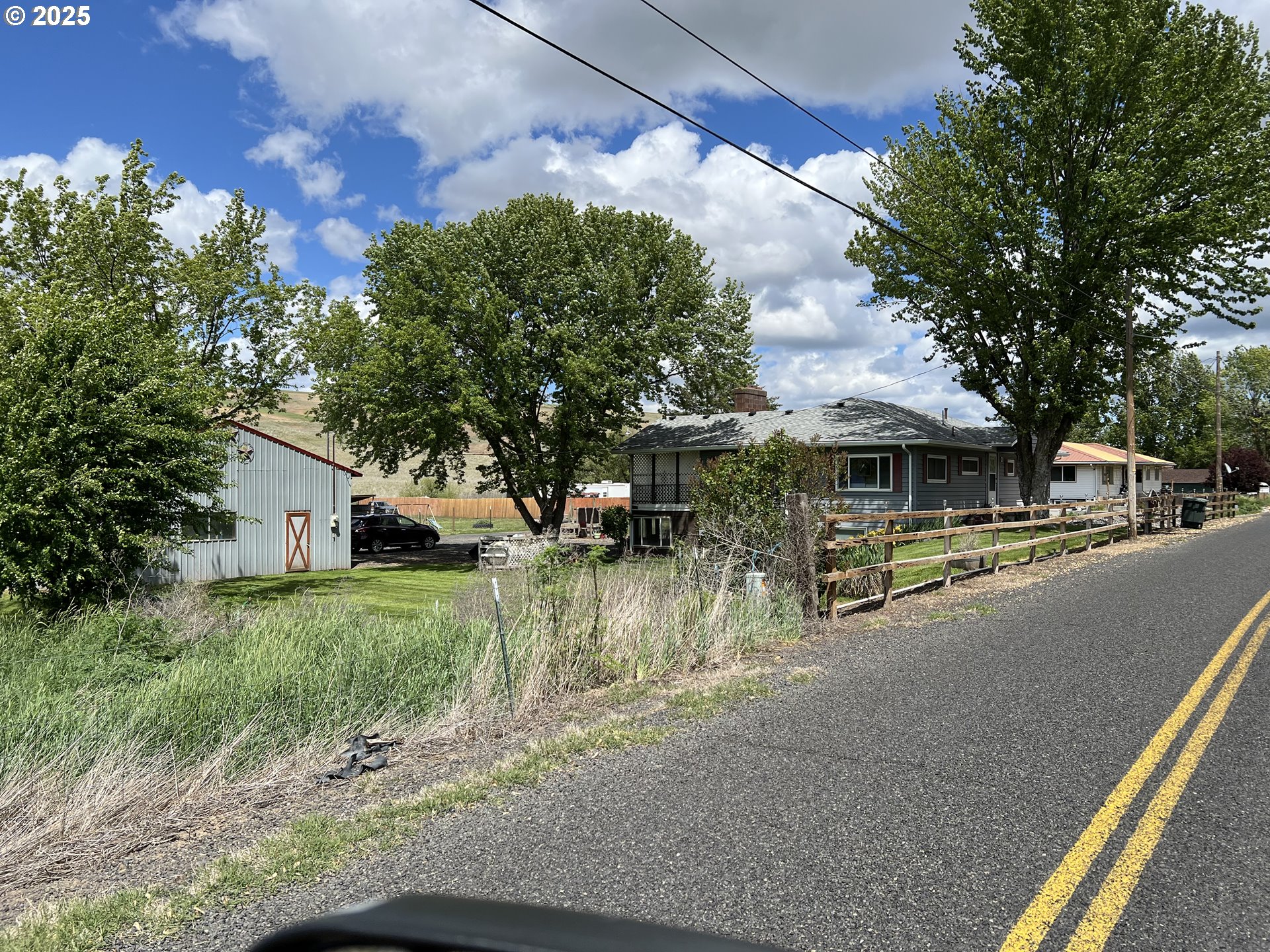46083 Adams Road Pendleton, OR 97801 - Photo 5 of 47 a front view of house with yard and green space