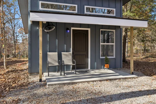 a bathroom with a sink a mirror and vanity