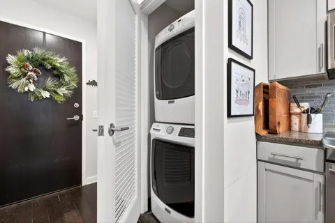 a view of a balcony with floor to ceiling window