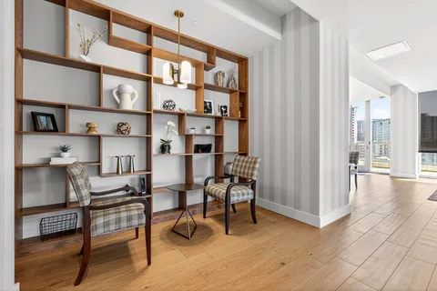 a view of a workspace with furniture