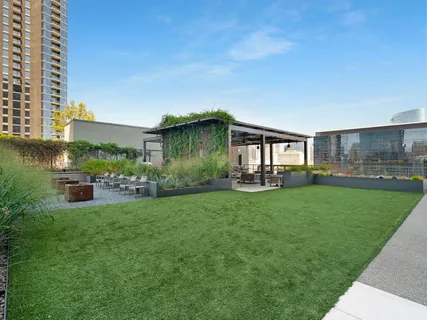 a view of a patio with couches table and chairs