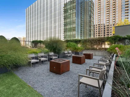 a view of a city with tall buildings