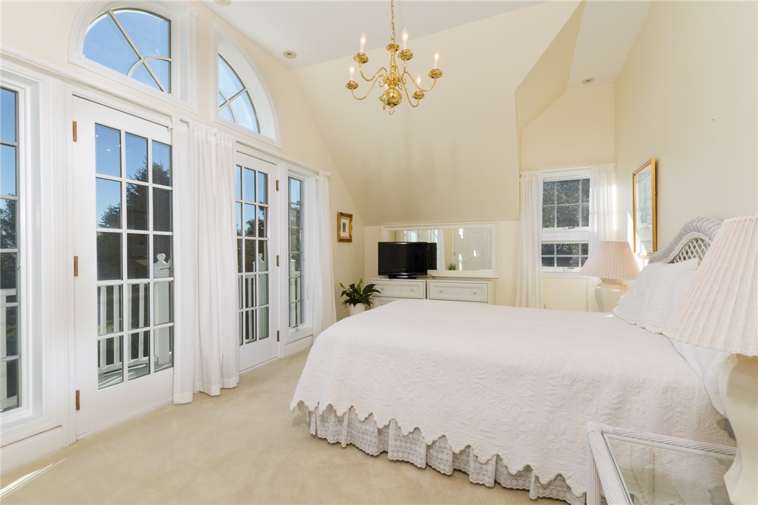 191 Old Beach Road Newport, RI 02840 - Photo 24 of 41 Guest room with high ceilings and French Doors to balcony.