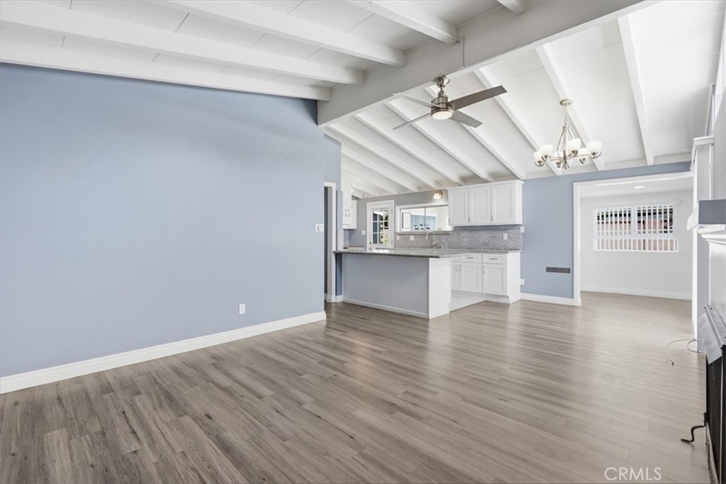 533 South Devon Road Orange, CA 92868 - Photo 10 of 50 a view of a kitchen with wooden floor and a kitchen