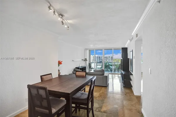 a view of a dining room with furniture
