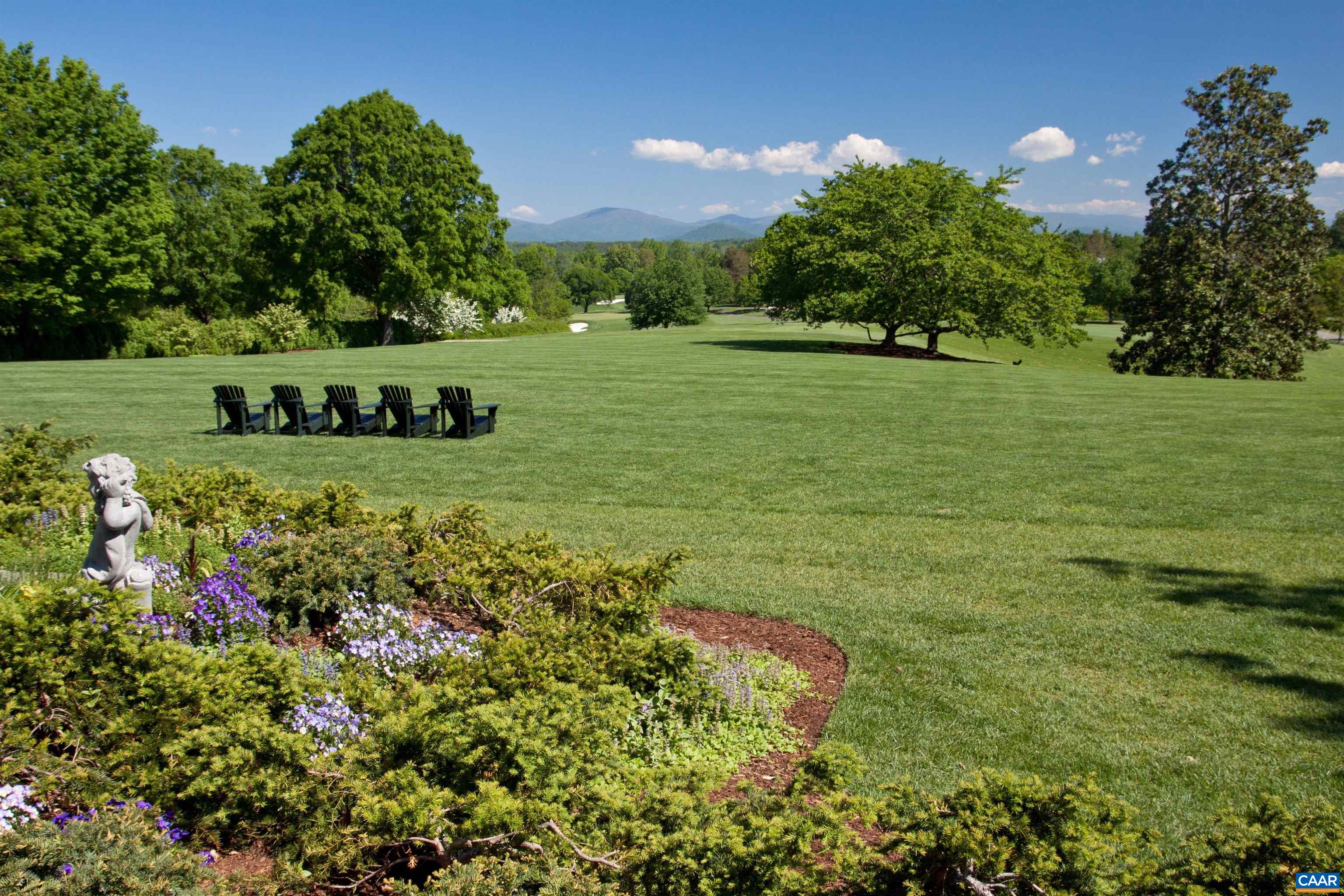 1715 Lake Road Charlottesville, VA 22901 - Photo 12 of 15 a view of a garden with a building in the background