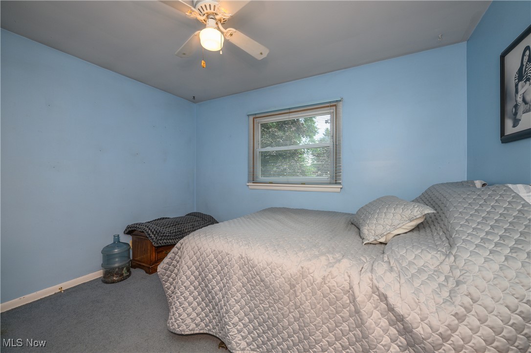 2856 Shellhart Road Barberton, OH 44203 - Photo 24 of 27 Bedroom with carpet flooring and ceiling fan