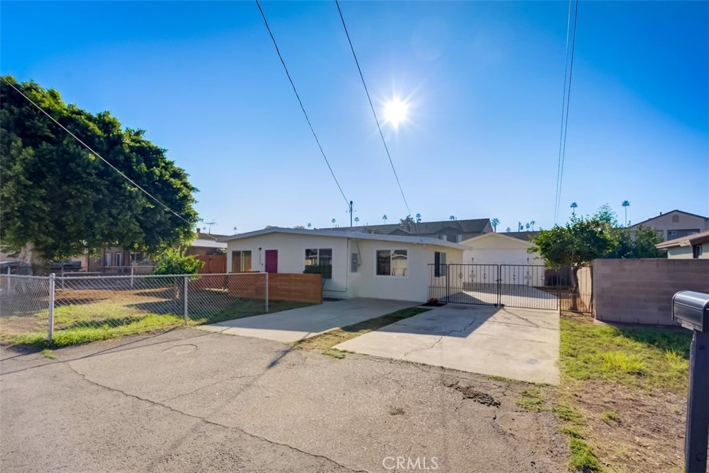 10630 Renner Street Riverside, CA 92505 - Photo 1 of 1 a view of a house with swimming pool and sitting area